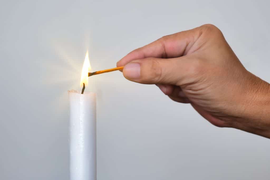 open flames from a candle create a fire safety hazard